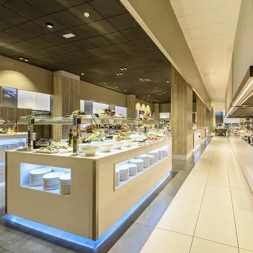 ESTIVAL: Elegant corporate buffet with diverse culinary offerings.