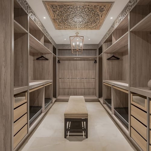 a walk in closet with a bench and a chandelier