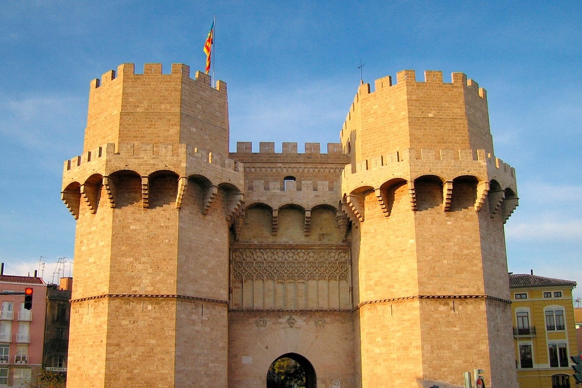 a castle with a flag on top of it
