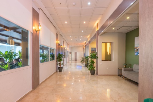 a long hallway with a sign that says ' a ' on it