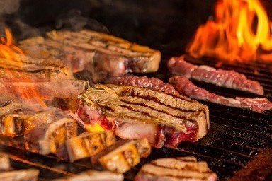 Different cuts of grilled meat