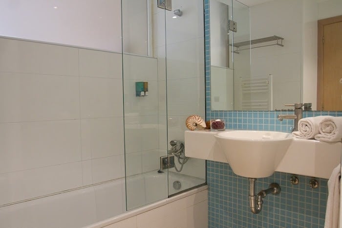 a bathroom with a sink and a bathtub