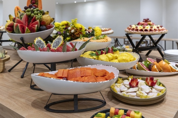 a variety of fruits are displayed on a table