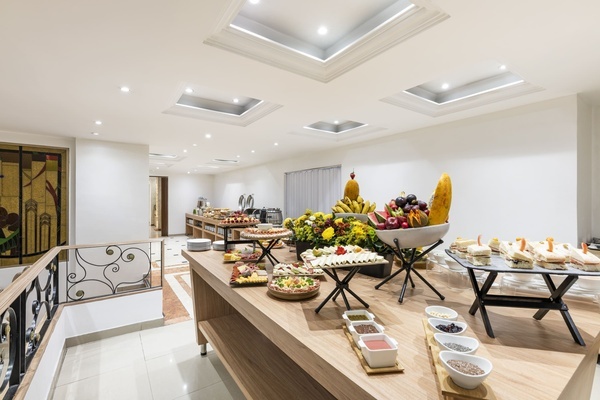 a buffet table with a variety of food on it
