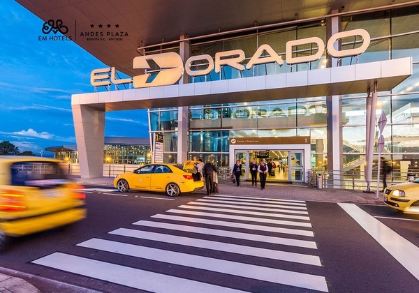 a sign for el dorado is above a crosswalk