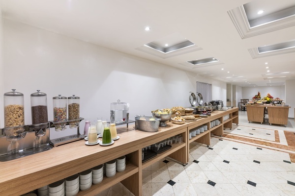 a buffet filled with a variety of food and drinks