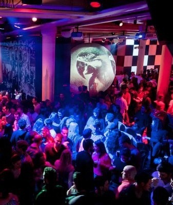 a blue rock in rio logo with a guitar on it