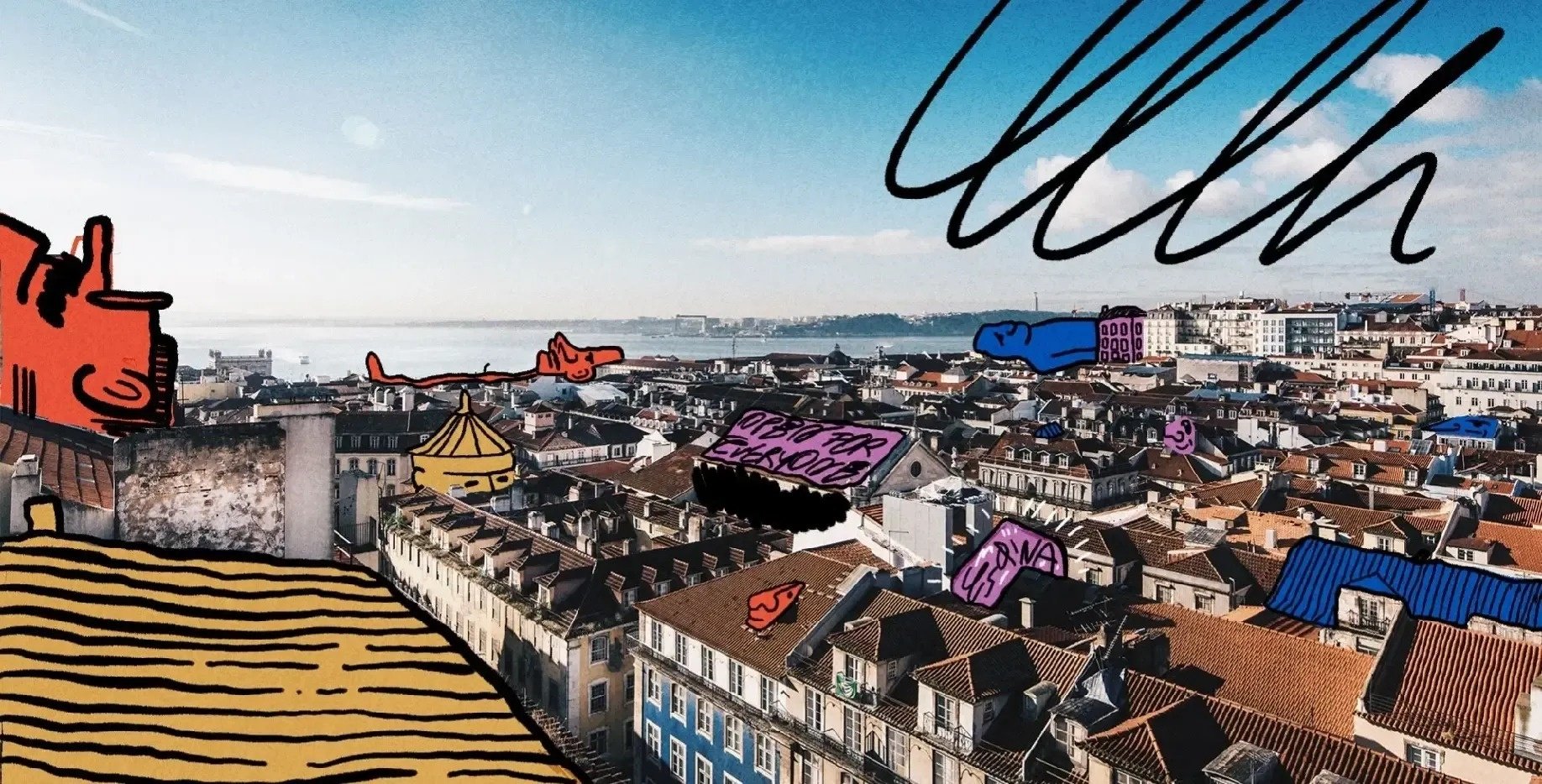 an aerial view of a city with graffiti on the roofs including one that says " i love for evermore "