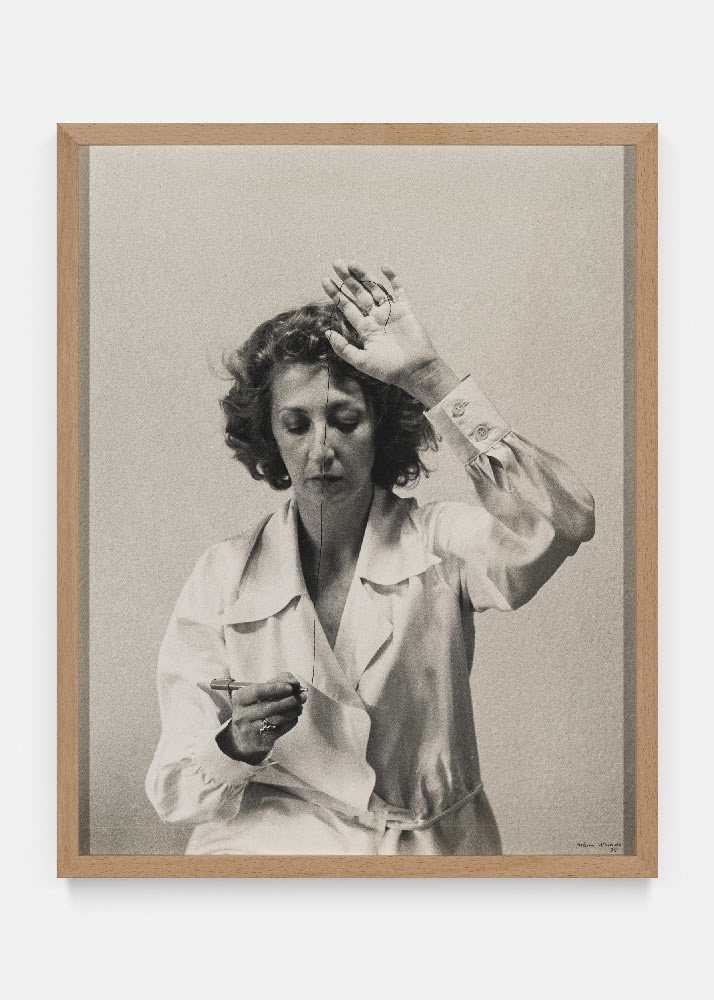 a black and white photo of a group of people in a bar with a coca cola sign on the wall