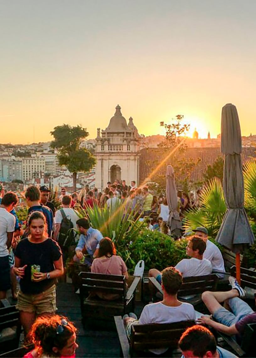 Esqina: Urban Lisbon cityscape from viewpoint bench.