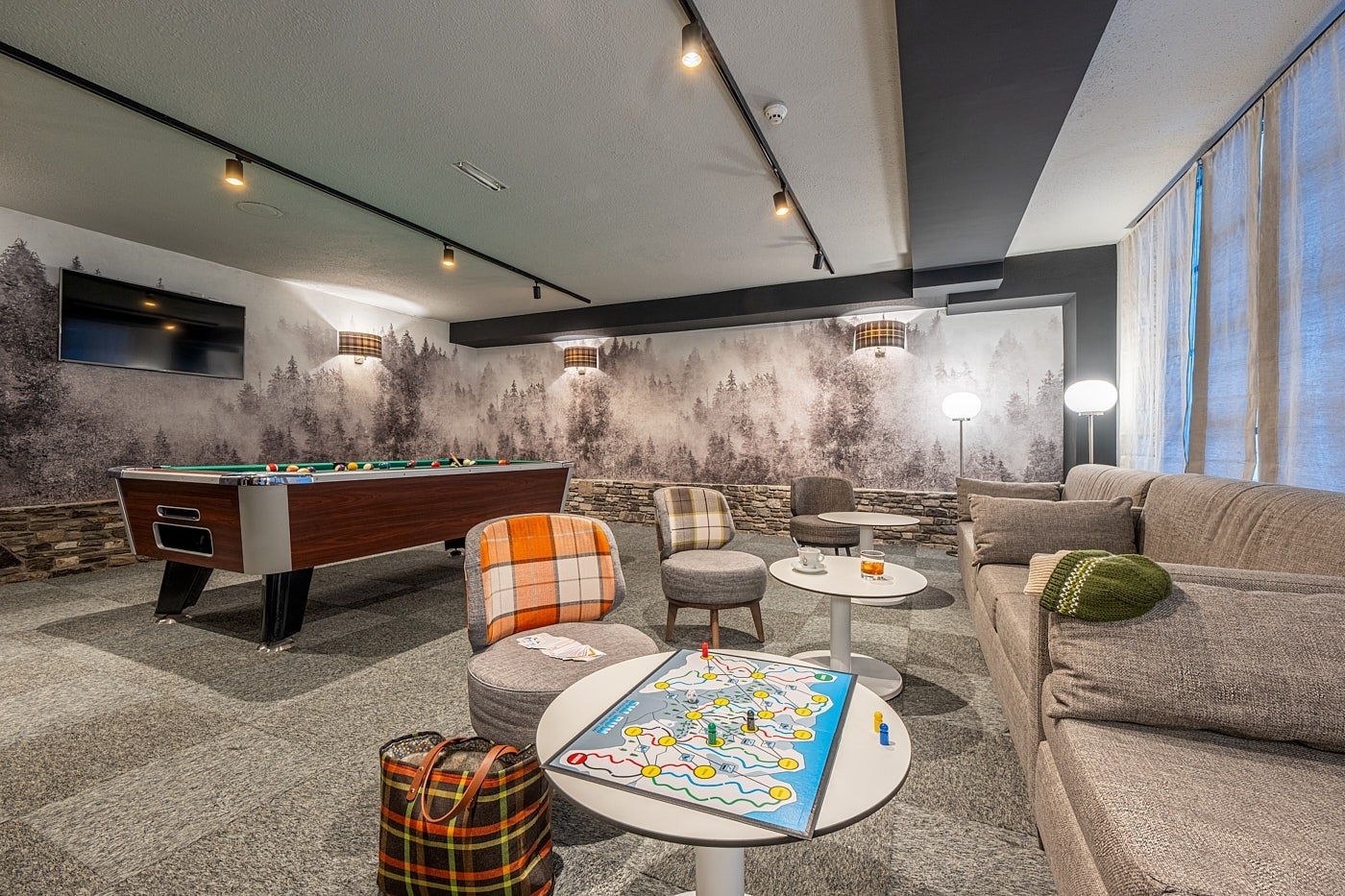 a room with a lot of chairs and tables