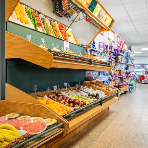 a display of fruits and vegetables in a grocery store