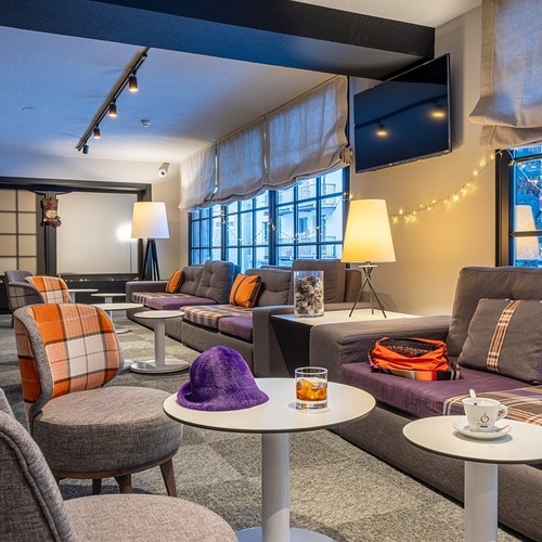 a purple hat sits on a table in a living room