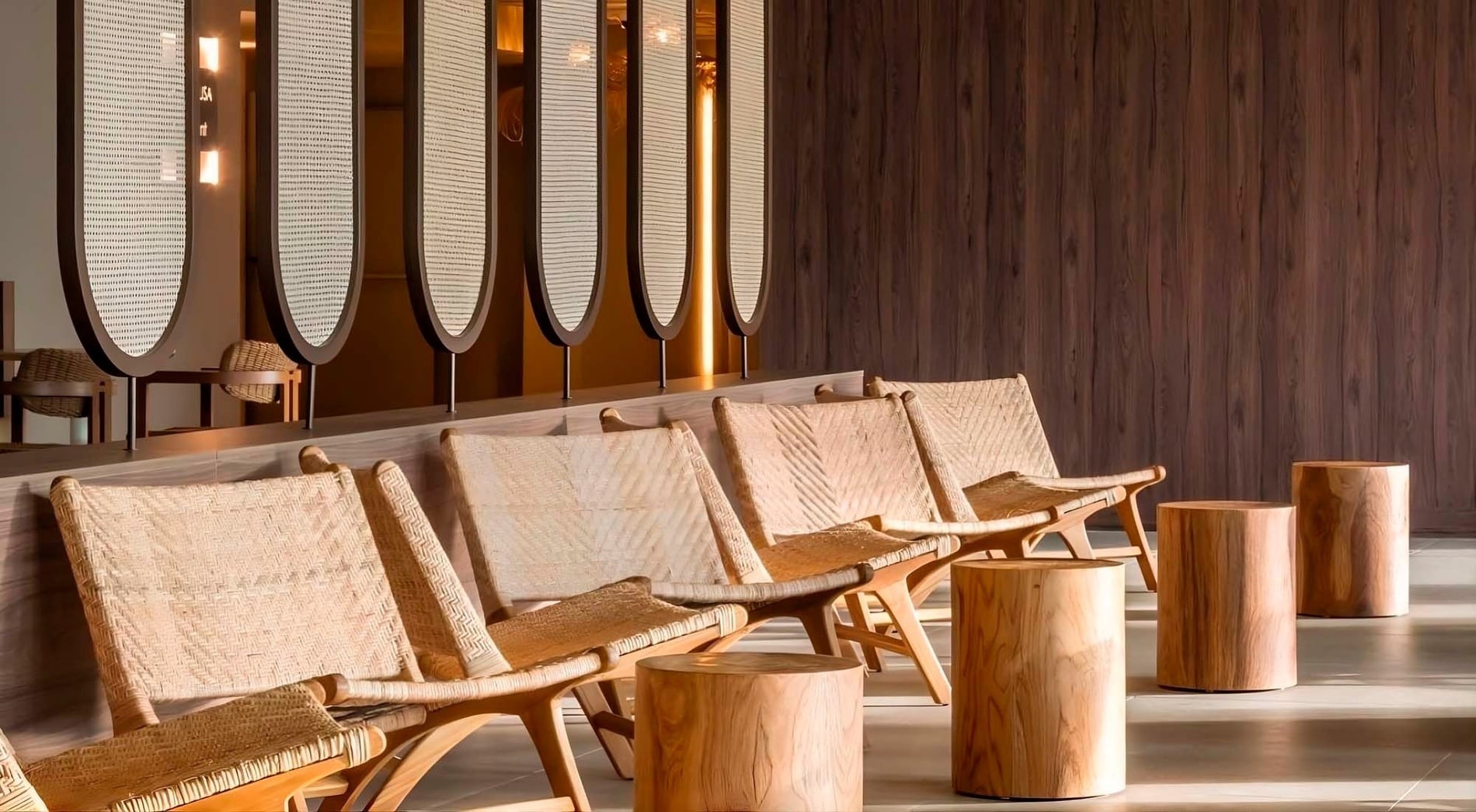 a group of people standing on a balcony overlooking the ocean