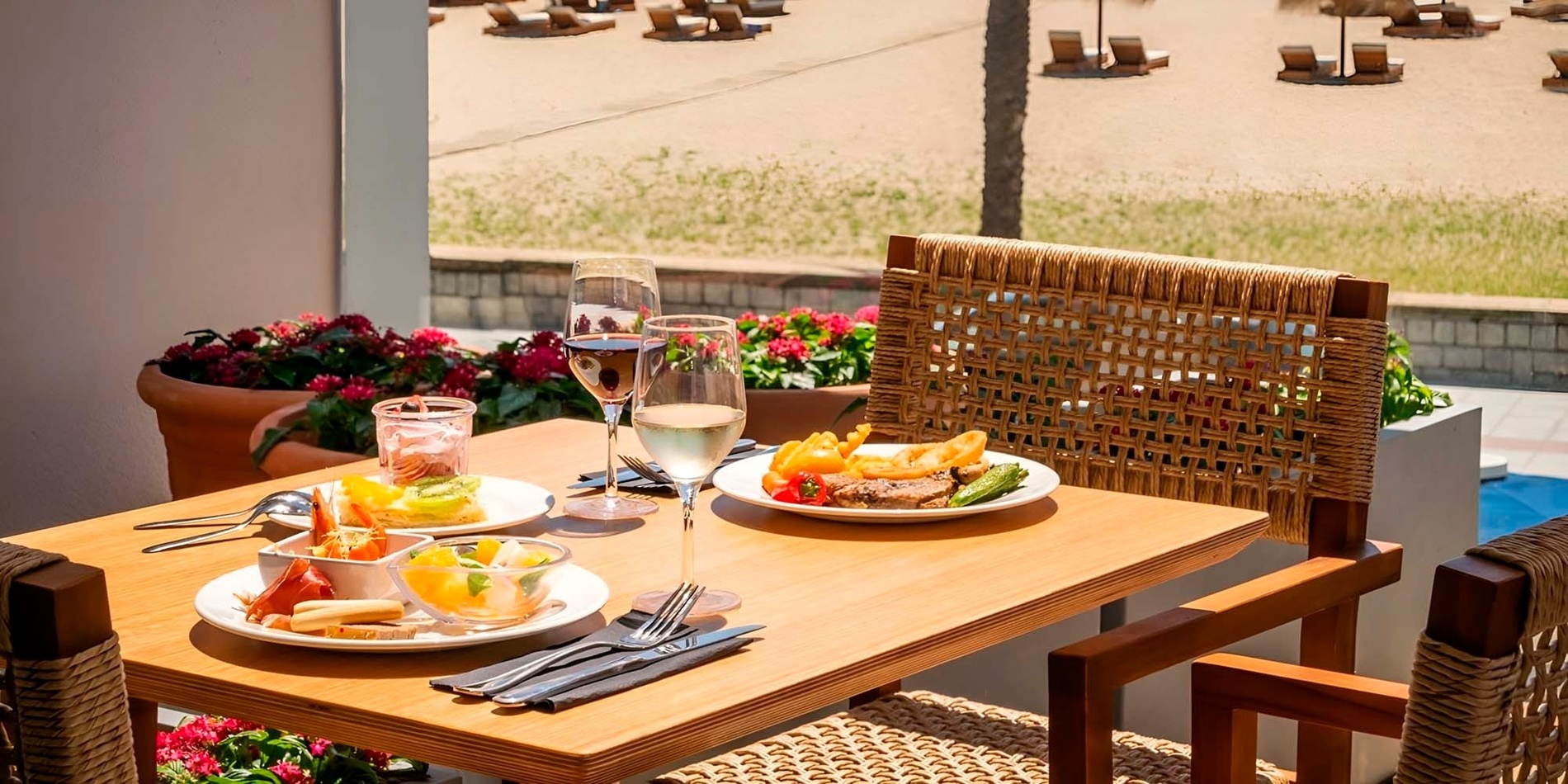 a plate of spaghetti with seafood on a wooden table