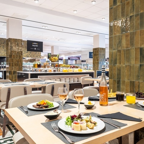 a restaurant with a sign that says lemon pizza