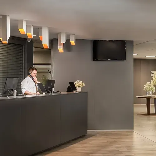 ESTIVAL Corporate Reception: Modern, welcoming area with attentive staff.