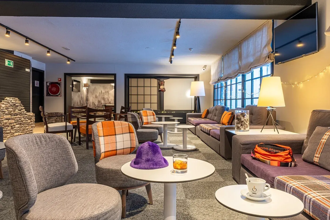 ESTIVAL Corporate lounge area with comfortable seating.