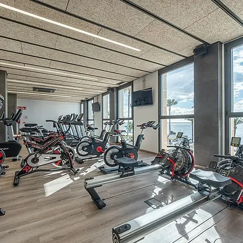 Modern gym with ocean views at Estival Torrequebrada Benalmádena.