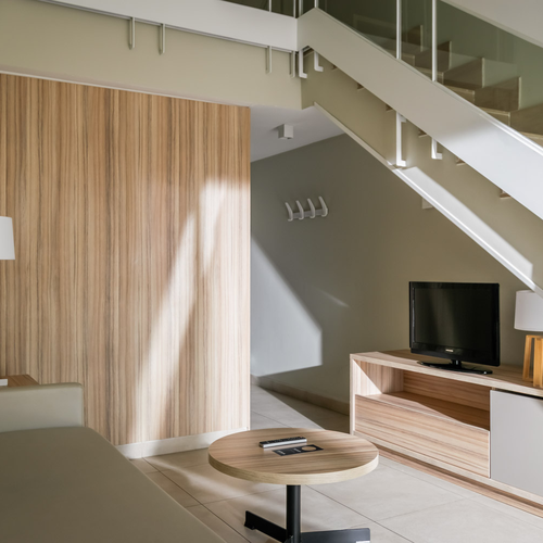 Modern living room with stairs at Estival Park Almaris | Estival Group | Tarragona