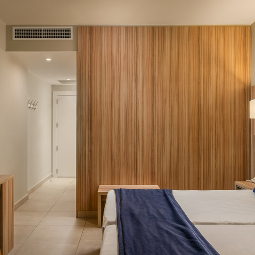 Comfortable hotel room with two beds at Estival Park Almaris, Tarragona. Official website.