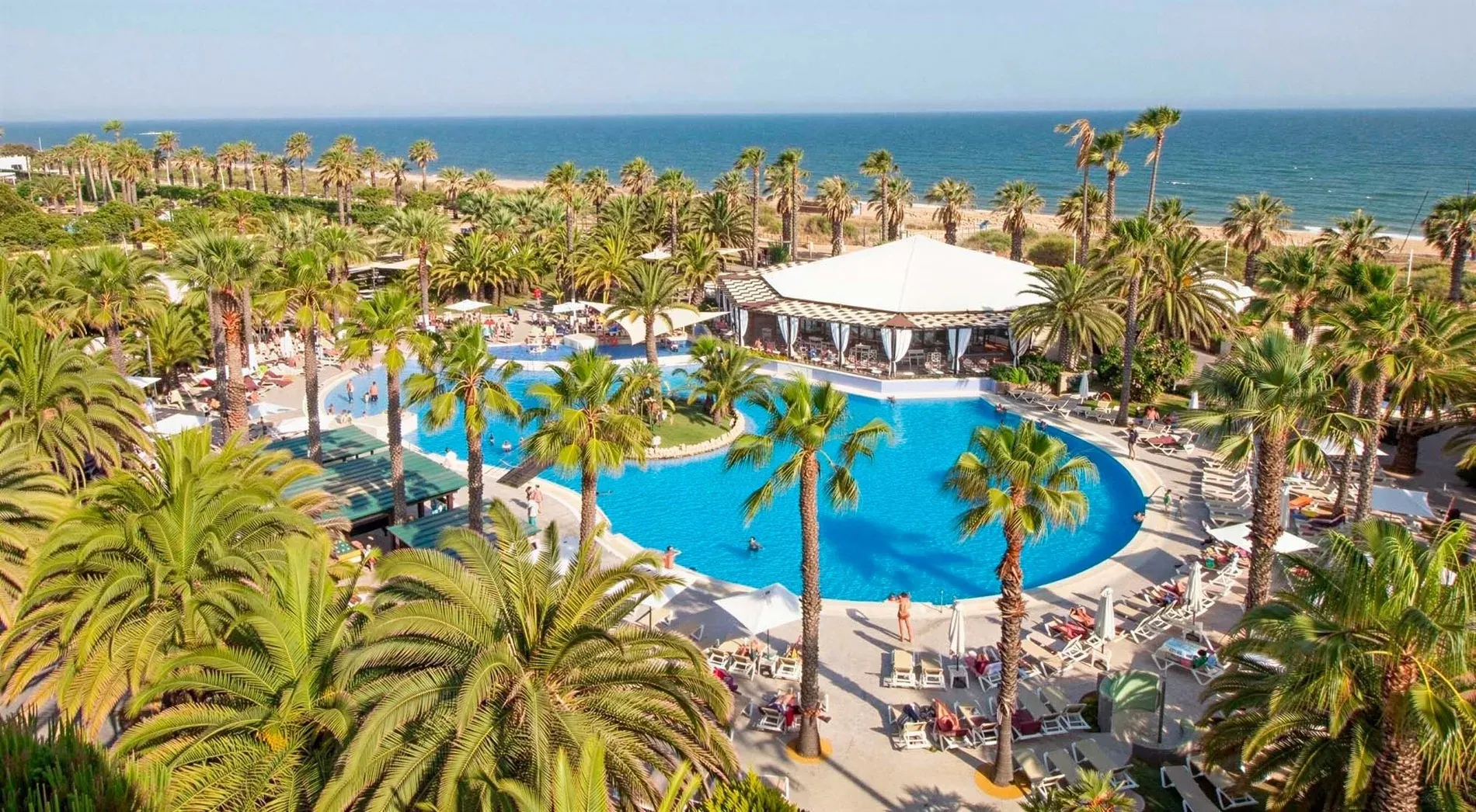 Location | Estival Islantilla 4* | Huelva: Tropical resort pool & beach.