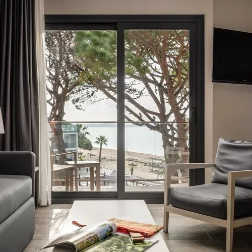 ESTIVAL Corporate room with sea view and balcony.