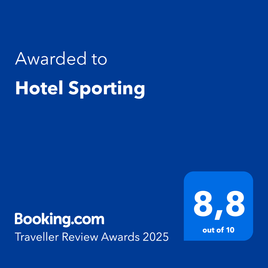un cartel azul que dice " premiado al hotel sporting "