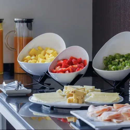 Hotel Vilamari Barcelona | Estival Group | Official Web: Fresh breakfast buffet with juices, fruits, cheese, and cold cuts.