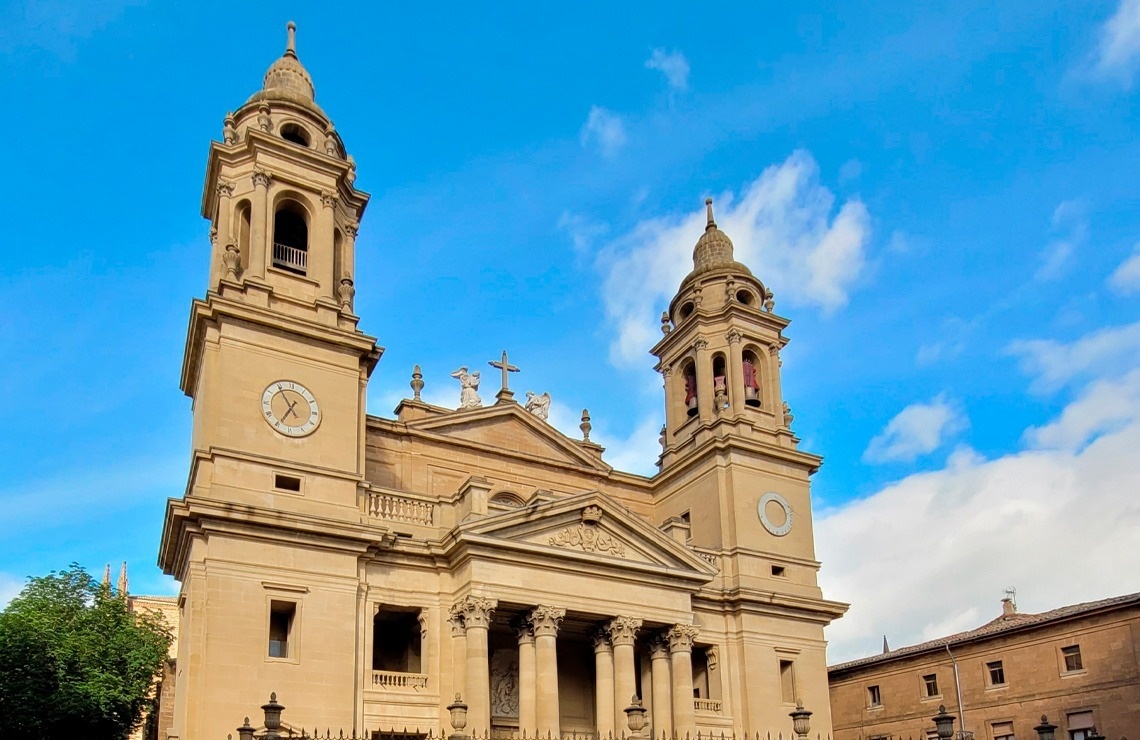 a large building with a clock on the top of it