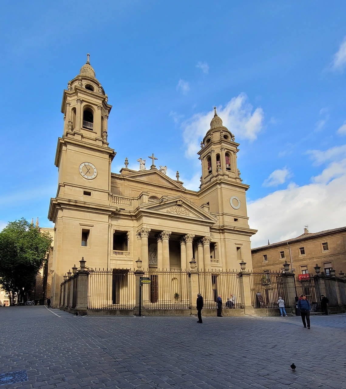 a large building with a clock on the top of it