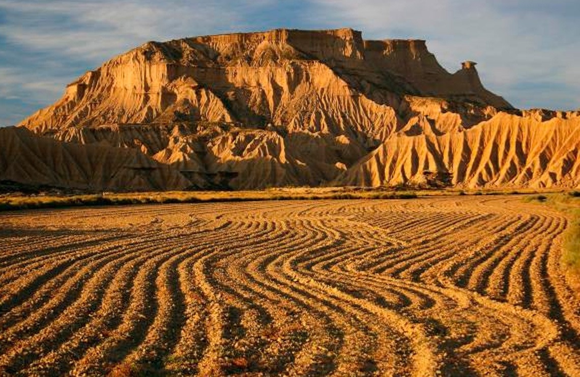 a large building with a clock on the top of it