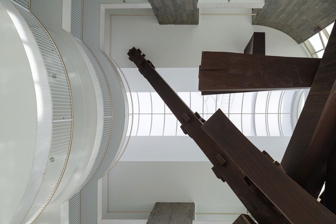 looking up at the ceiling of a building