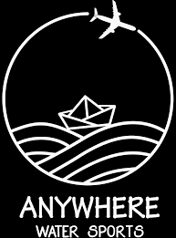 Feet up: Corporativa adventure. Logo with airplane, boat, and waves.