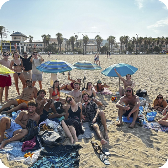 Beach vacation: people relaxing with feet up. Corporate.