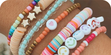 Colorful bracelets with smiley faces and stars, ideal for relaxing and putting your feet up: Corporate.