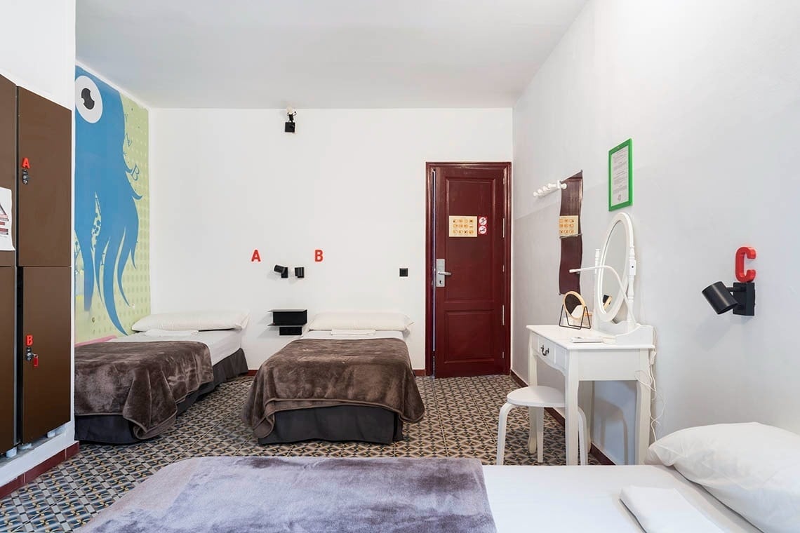 Beds in a dorm room at Hôme Youth Hostel Valencia | Feet Up | Valencia.