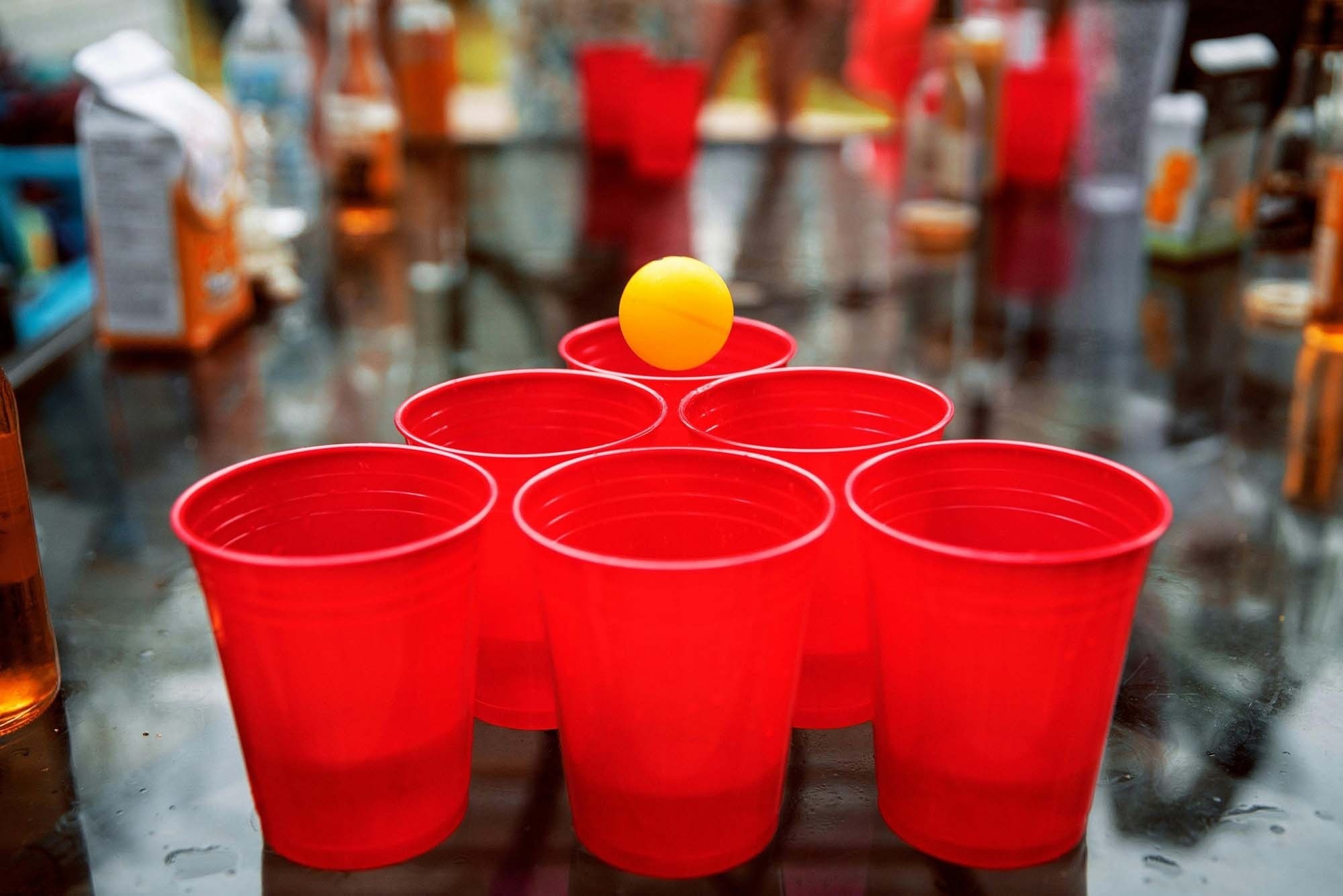 Relax and put your feet up: corporate. Red cups and ball for a fun table game.