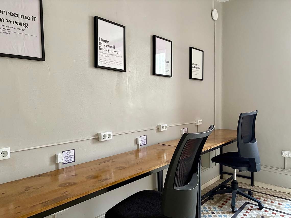 Modern corporate desks, perfect for putting your feet up and working.