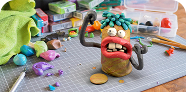 Claymation character 'Feet up: Corporativa' ready for action. Fun and creative!