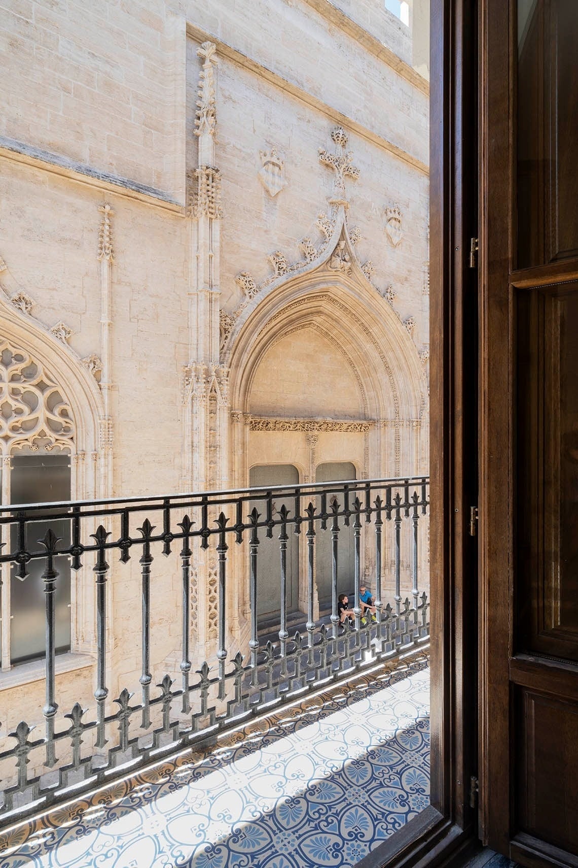 Ornate balcony with views of Valencia's gothic architecture at Hôme Youth Hostel Valencia | Feet Up.