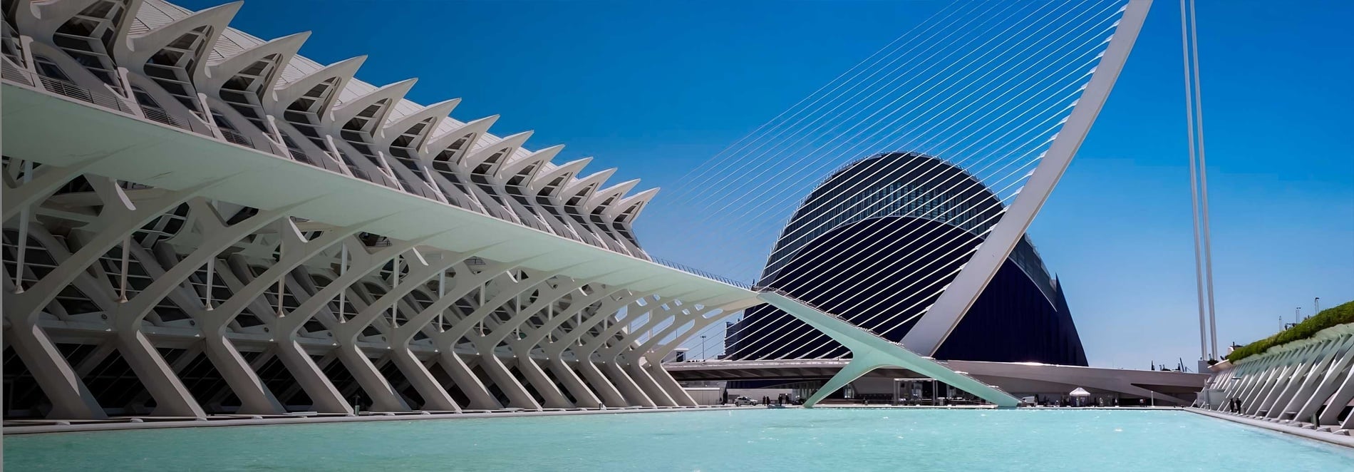Futuristic building with bridge and water, perfect for feet up: corporate.