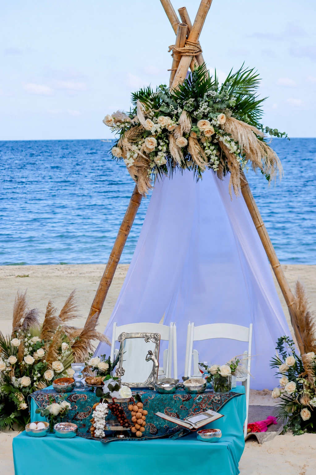 Bride and groom during a romantic beach wedding ceremony in Riviera Maya