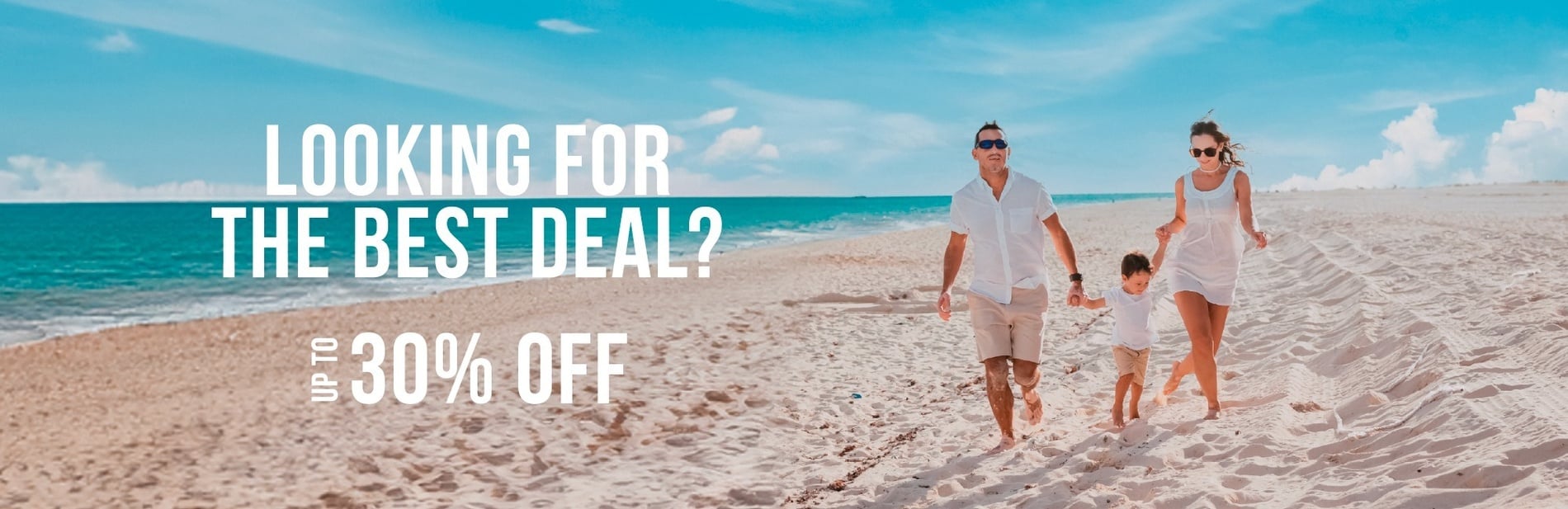 Family walking along the beach during a winter vacation in Riviera Maya