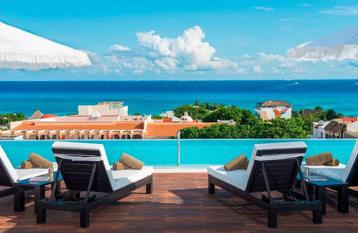 Rooftop pool with ocean views at The Fives Downtown Hotel - Curio Collection by Hilton. Official website.