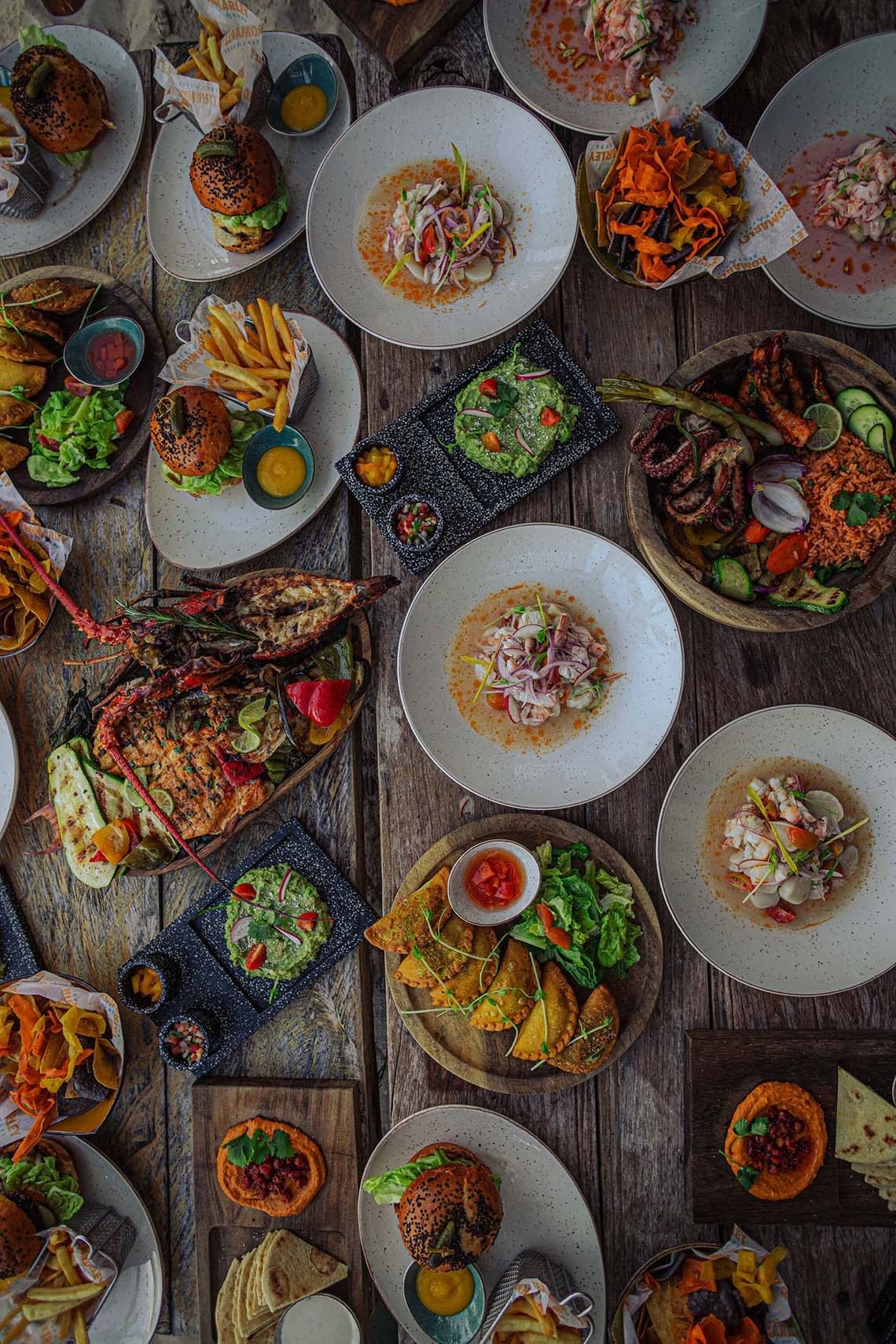 Deliciosa variedad de mariscos y platos frescos en The Fives Oceanfront Riviera Maya - Web oficial.