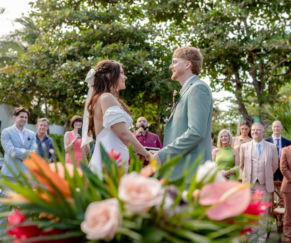 Elegant garden wedding ceremony surrounded by greenery