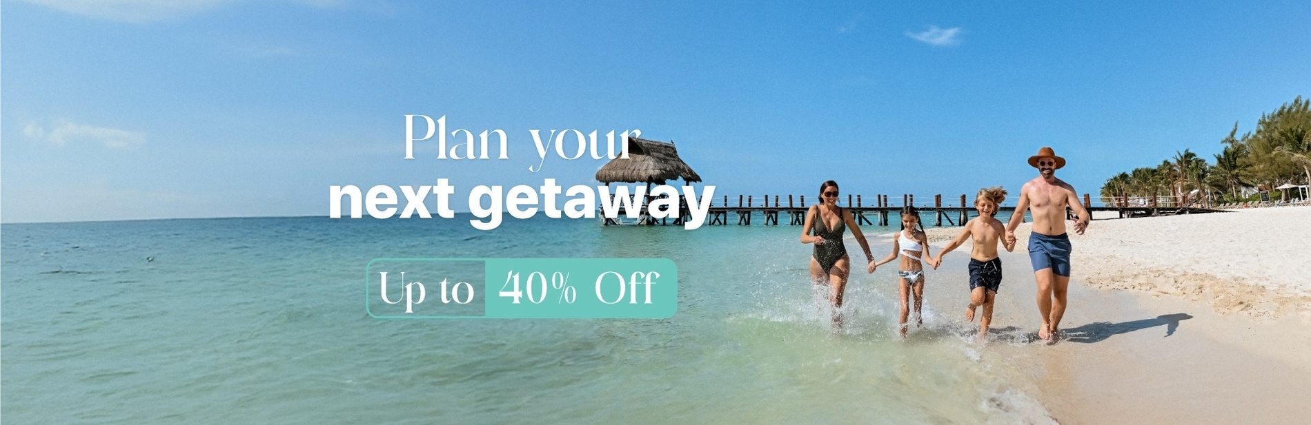 a man and woman standing on a balcony overlooking a swimming pool