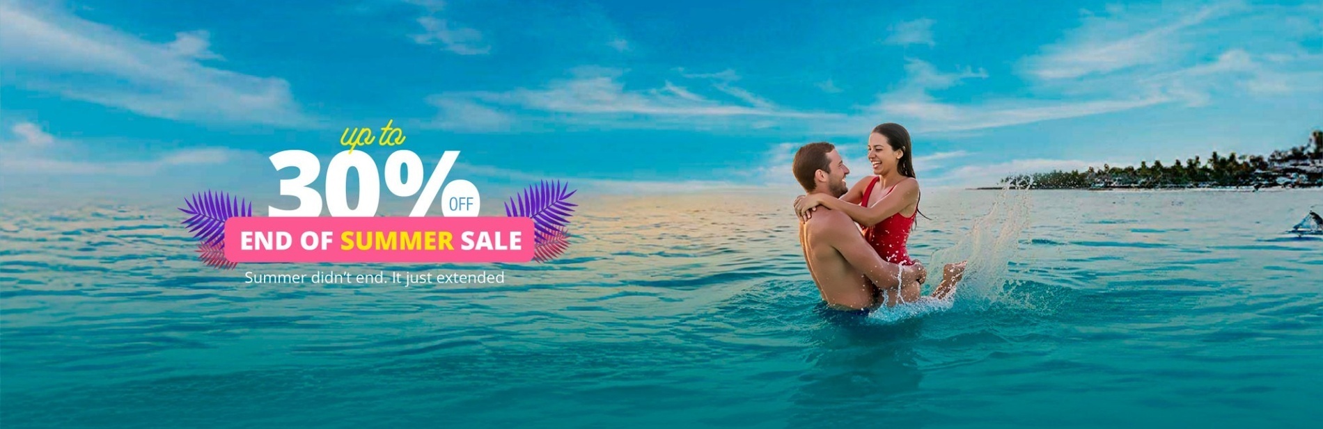 a man and woman standing on a balcony overlooking a swimming pool