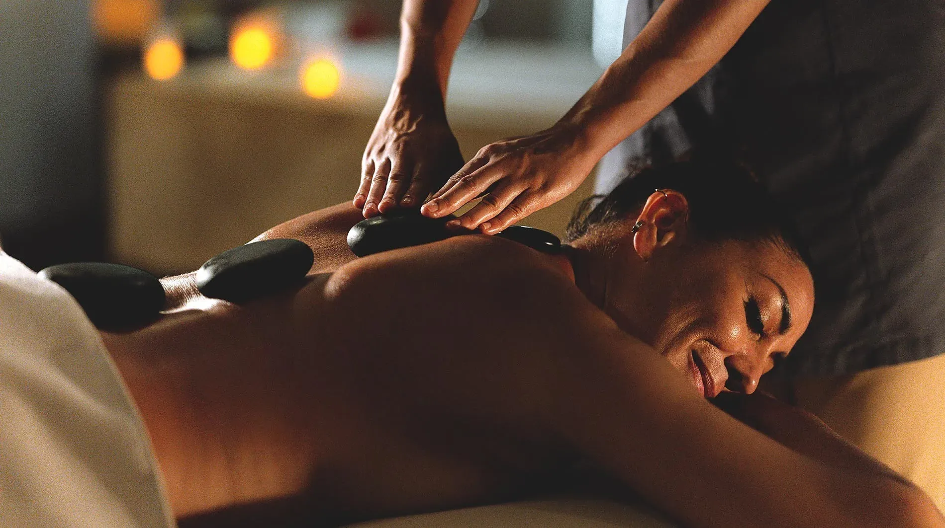 Experience hot stone massage at The Spa by The Fives | The Fives Hotels.
